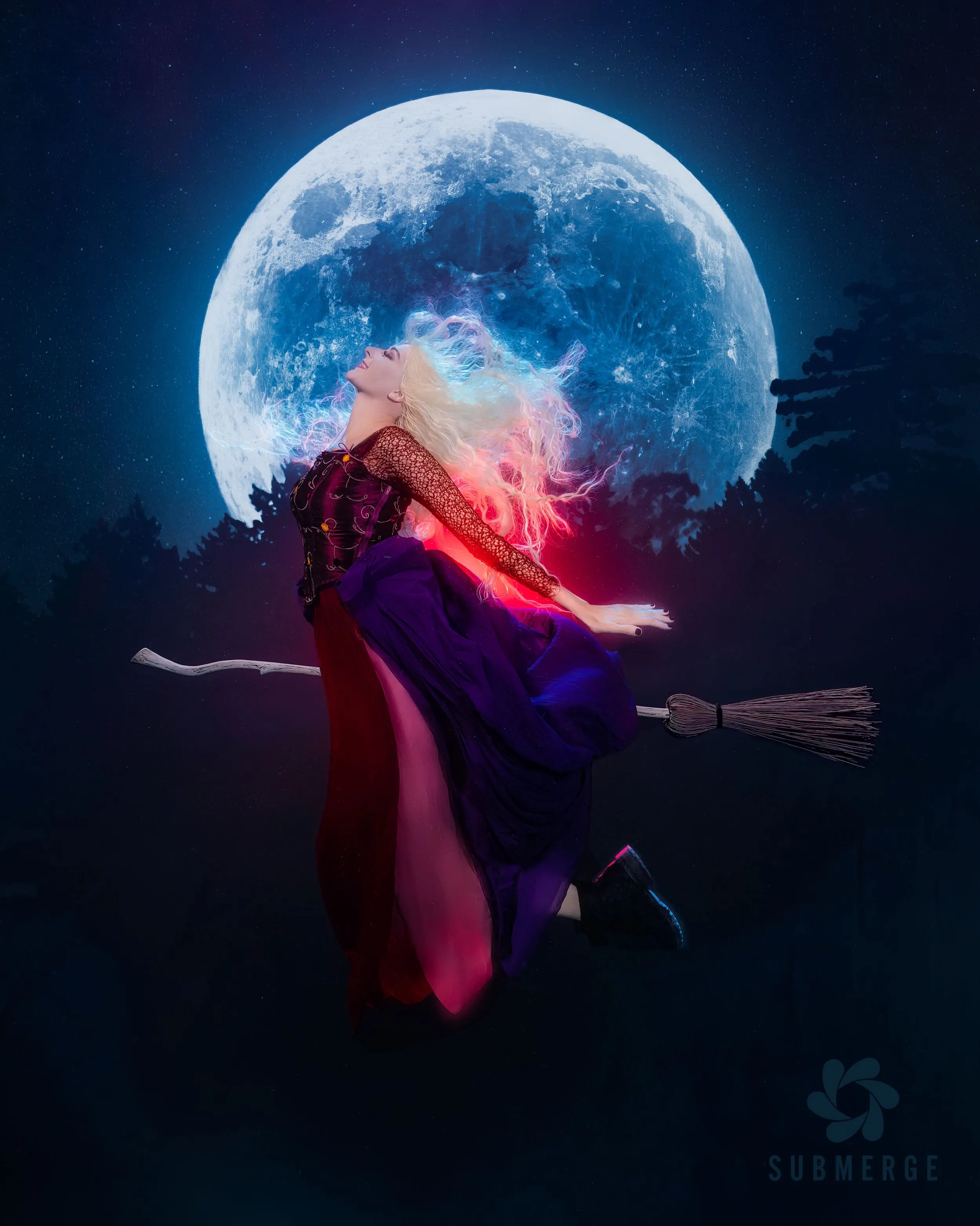 Underwater portrait of a witch riding a broomstick before a glowing full moon — staged and photographed entirely underwater